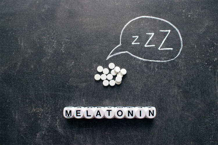 a row of dices picturing melatonin word